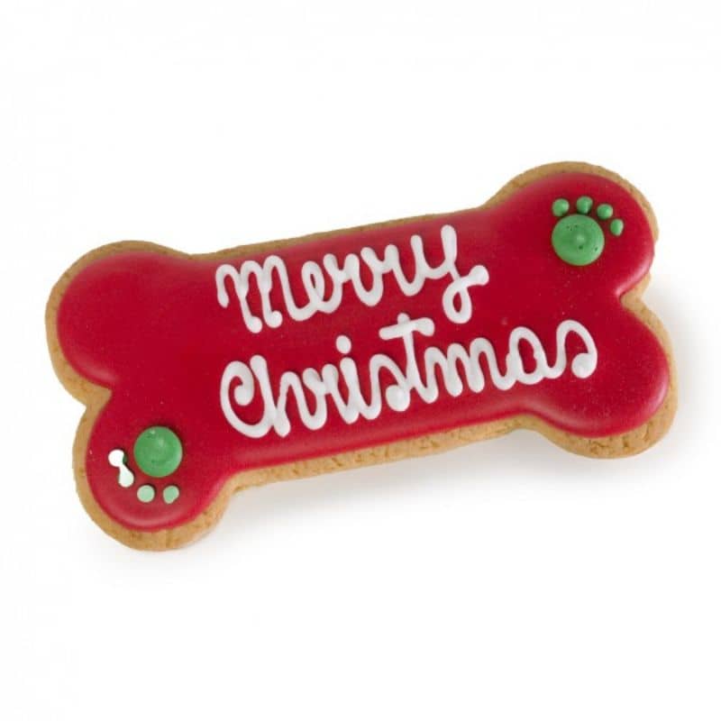 Détail du biscuit de noel pour chien en forme d'os merry christmas en rouge - cadeaux de noel chien fabrication artisanale