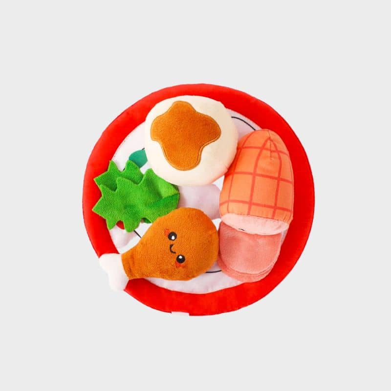 jouet interactif peluche repas de noel dans laquelle vous pouvez cacher des friandises pour occuper votre chien happy woofmas christmas dinner Hugsmart