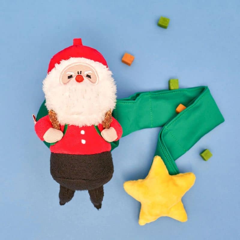 Jouet de fouille The Furryfolks en forme de Père Noël idéal pour occuper son chien avec un squeaker dans l'étoile