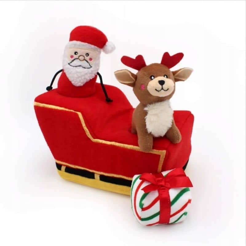 Peluche de fouille pour occuper son chien en forme de traineau dans lequel cacher des friandises et 3 mini peluches père noel, renne et cadeau 