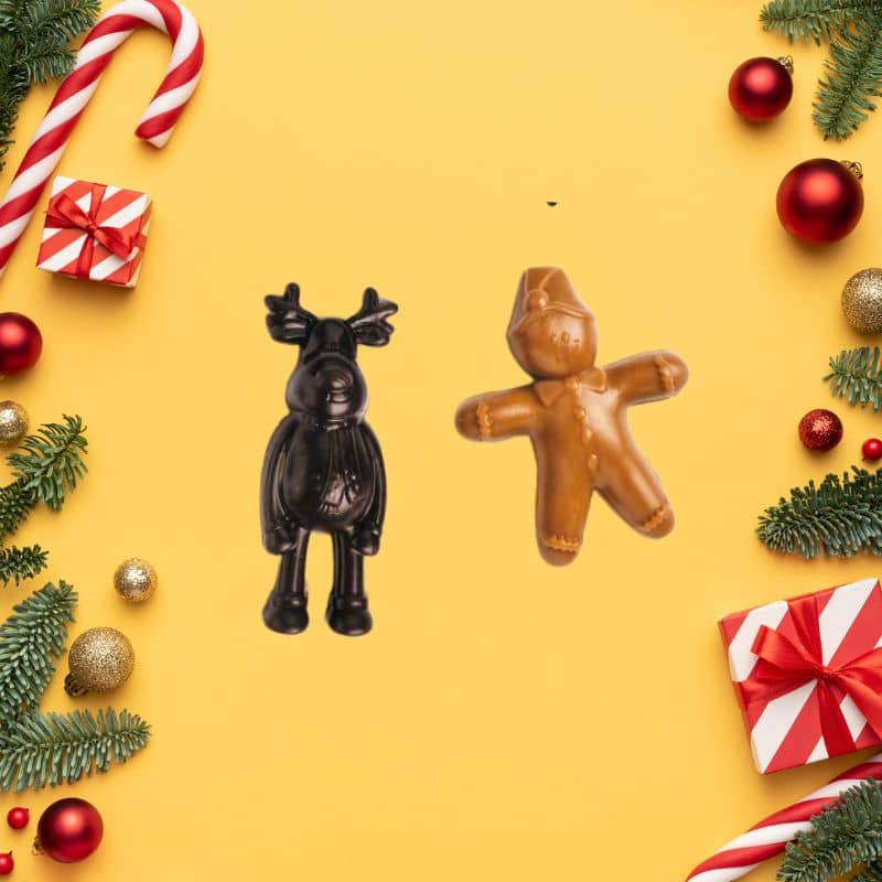 snack dentaire friandise à macher pour chien gout peanut butter en forme de gingerbread et renne du pere noel